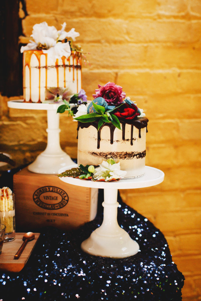 Drip cakes on white cake stands with a sparkly La Tavola linen. Sacramento Event Planner, KMK Design