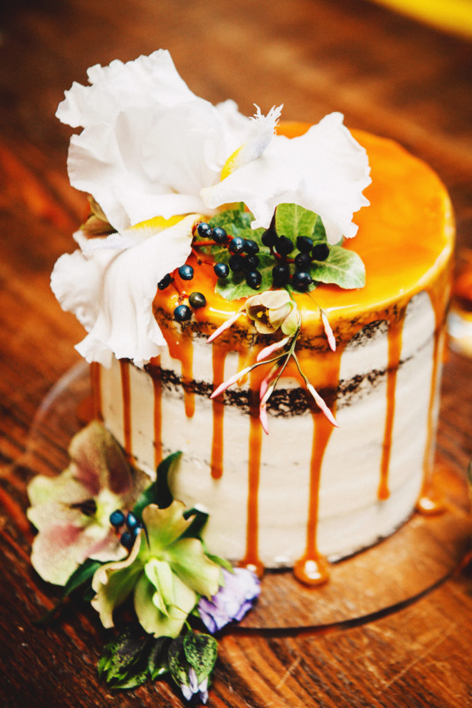 A custom drip cake for a whiskey tasting party hosted by Sacramento event planner, KMK Design